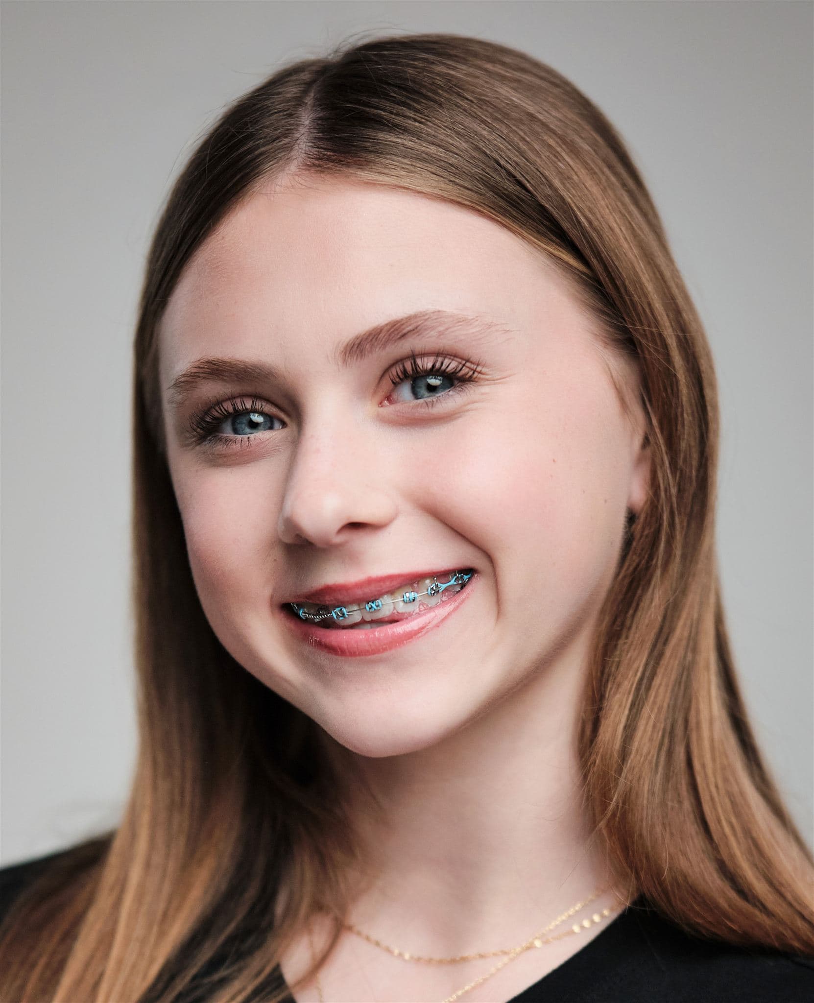 Child headshot with gentle expression coaching in St. Louis by Henry David Photography