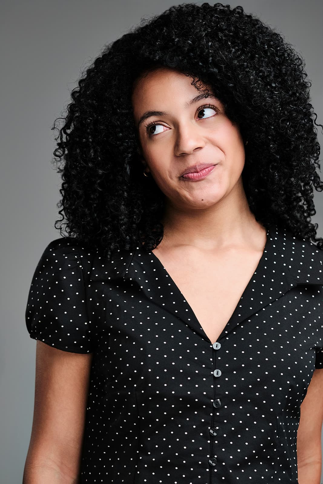 Children's headshot with natural joyful expression in St. Louis studio by Henry David Photography