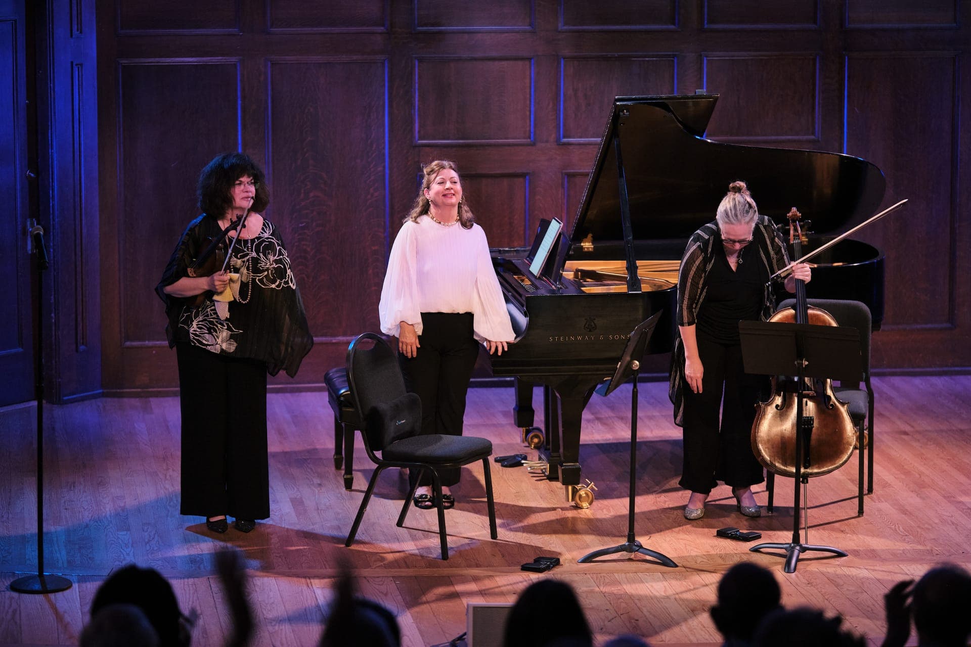 The Calyx Piano Trio on stage at The Sheldon in St. Louis: Catherine French on violin, Nina Ferrigno at the piano, and Jennifer Lucht on cello.