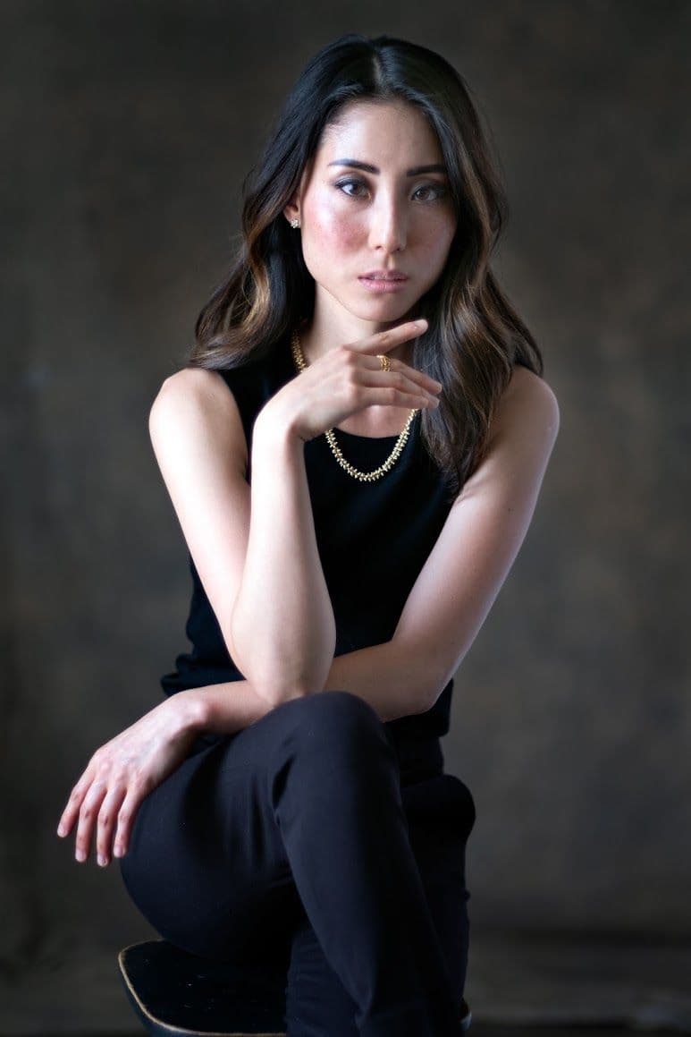 Studio portrait with Rembrandt lighting for modeling portfolio