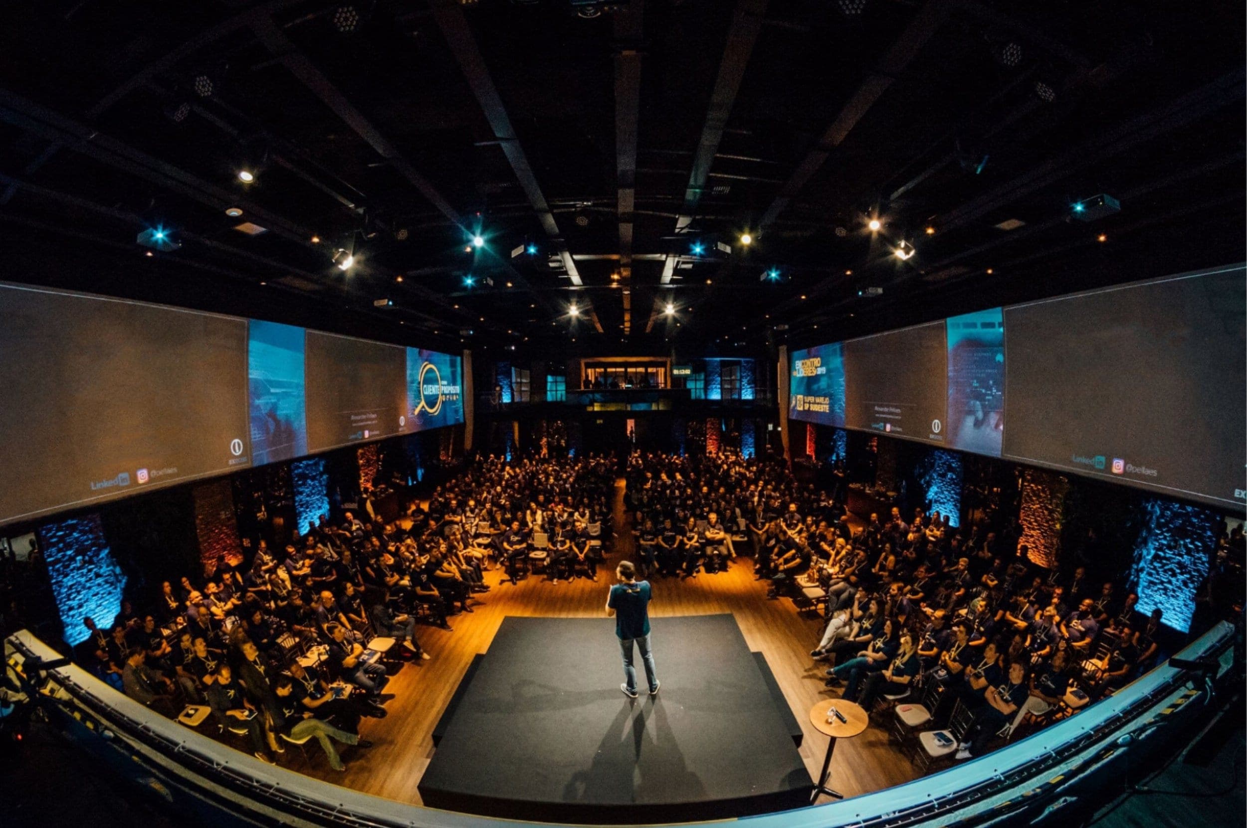 Wide interior view of a large St. Louis conference venue with rows of seating, the kind of footprint that supports a portable headshot booth setup