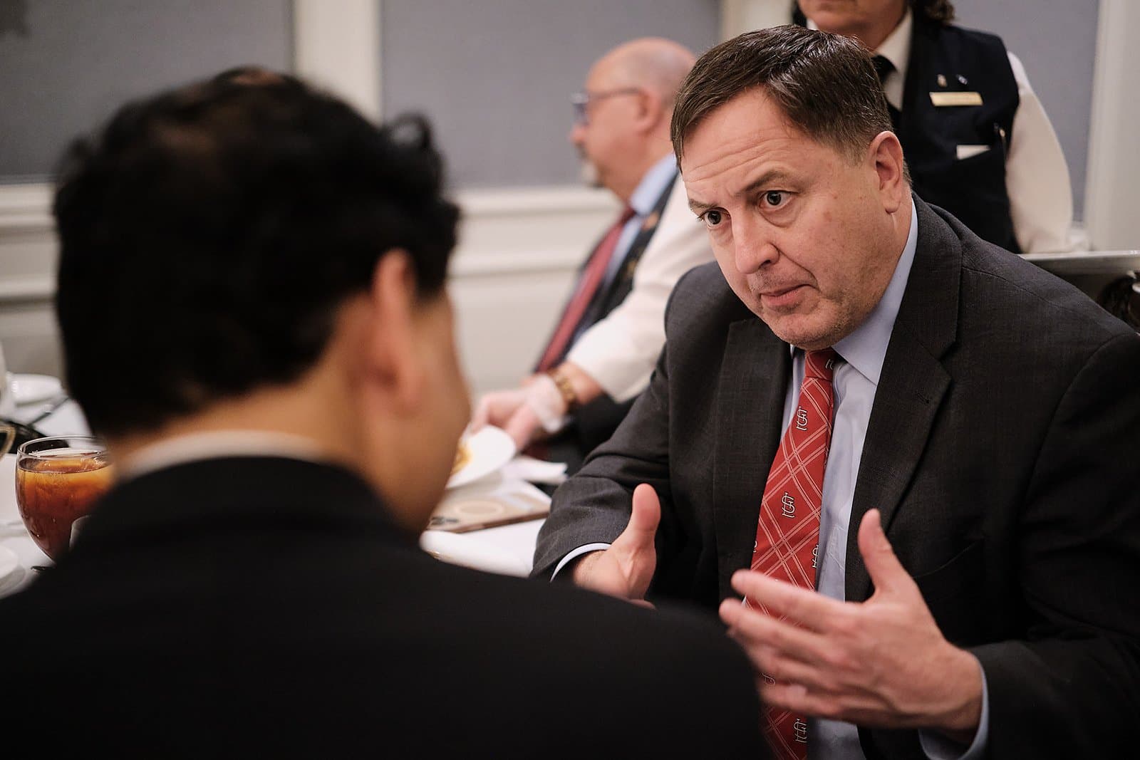 Corporate event photography with keynote speakers by Henry David Photography