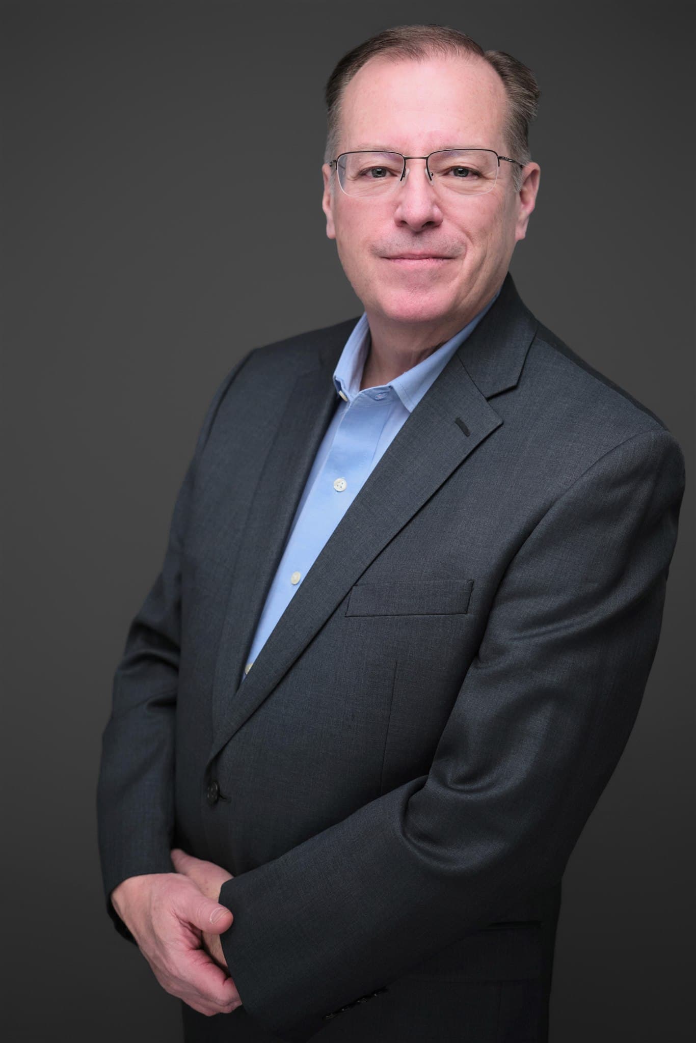 Studio headshot of Tom Koppinger by St. Louis photographer Henry David