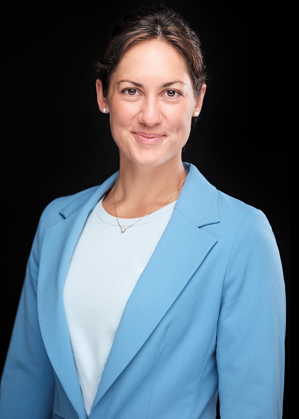 Professional headshot on a black studio backdrop, St. Louis, by Henry David Photography