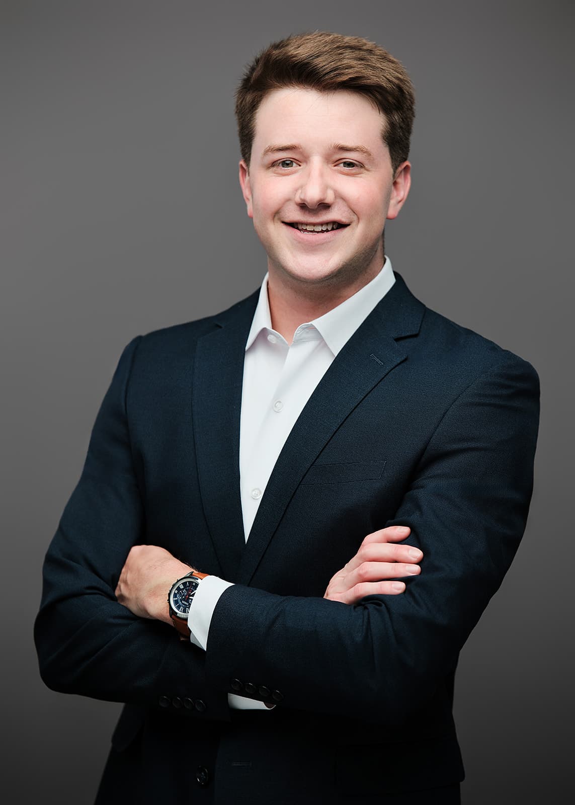 Studio headshot with gray backdrop for Webster Groves professional by Henry David Photography