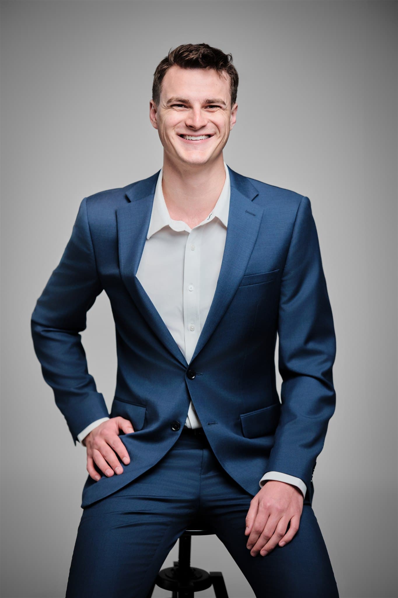 Corporate headshot with confident expression by Henry David Photography in St. Louis