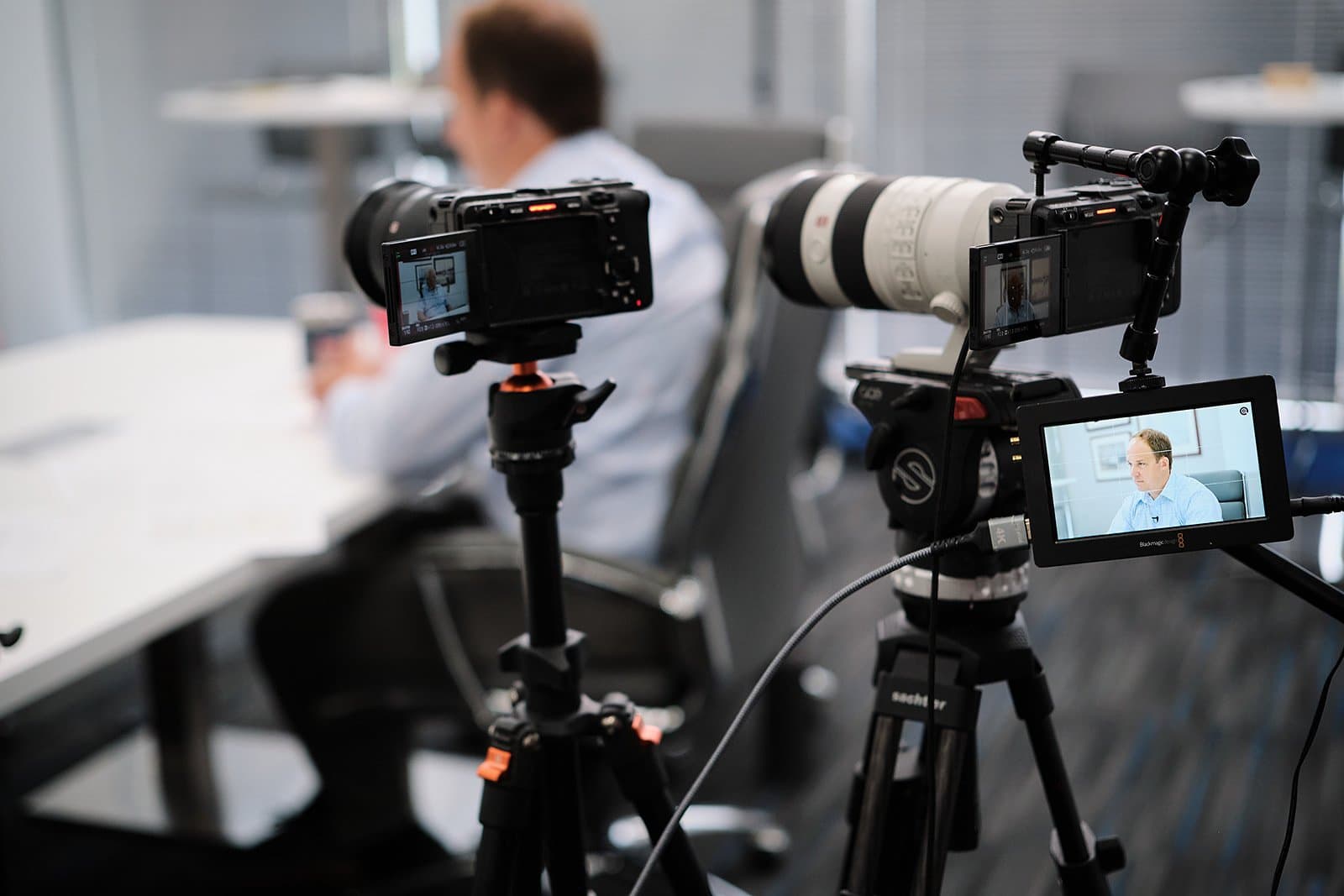 Behind-the-scenes attorney interview video production at professional law office