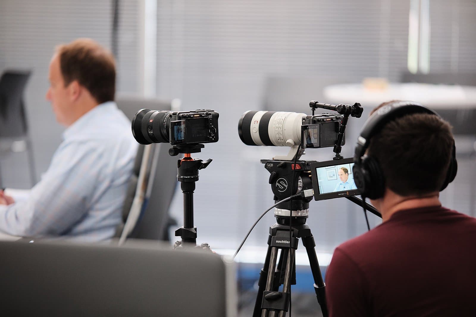 Heavy agricultural equipment staged for professional photography at a Midwest dealership