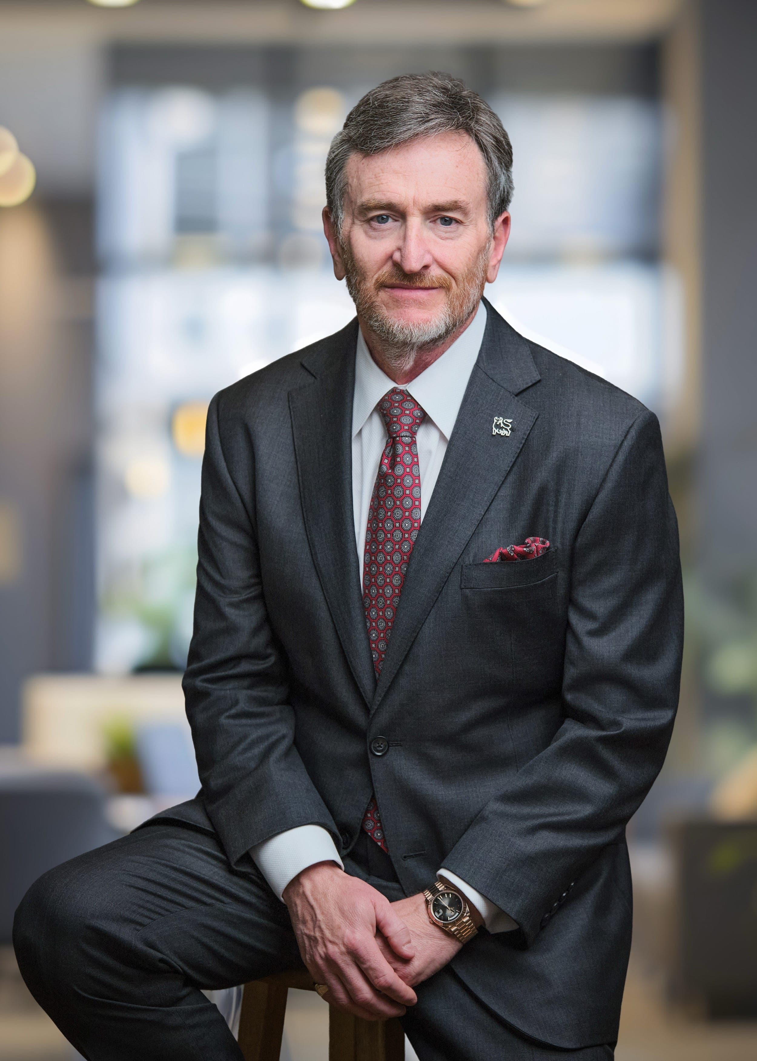 Consistent team page headshot of a Merrill Lynch principal photographed in Clayton, St. Louis by Henry David Photography