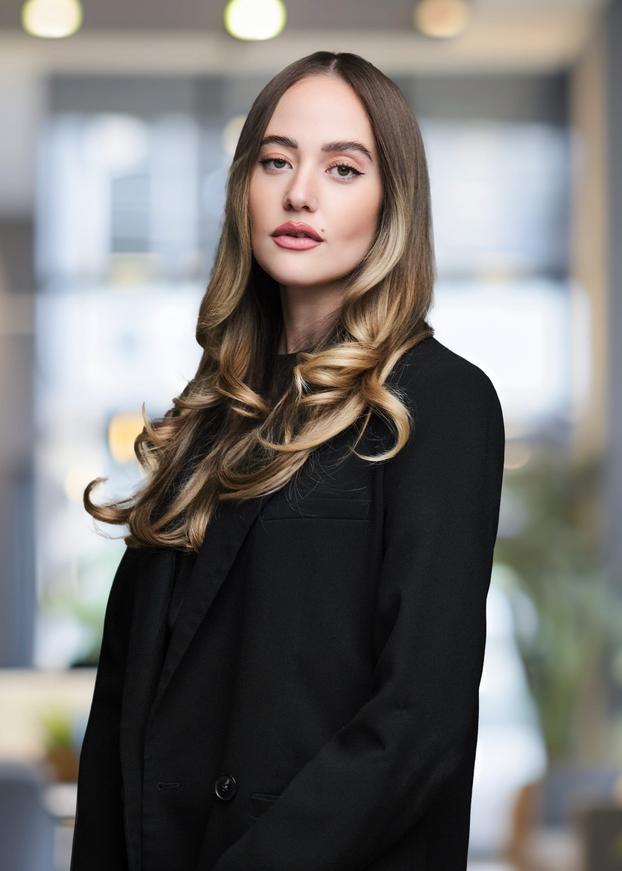 Isabella Poggioli of the Taxman & Landy Team at Merrill Lynch in Clayton. Professional headshot by Henry David Photography