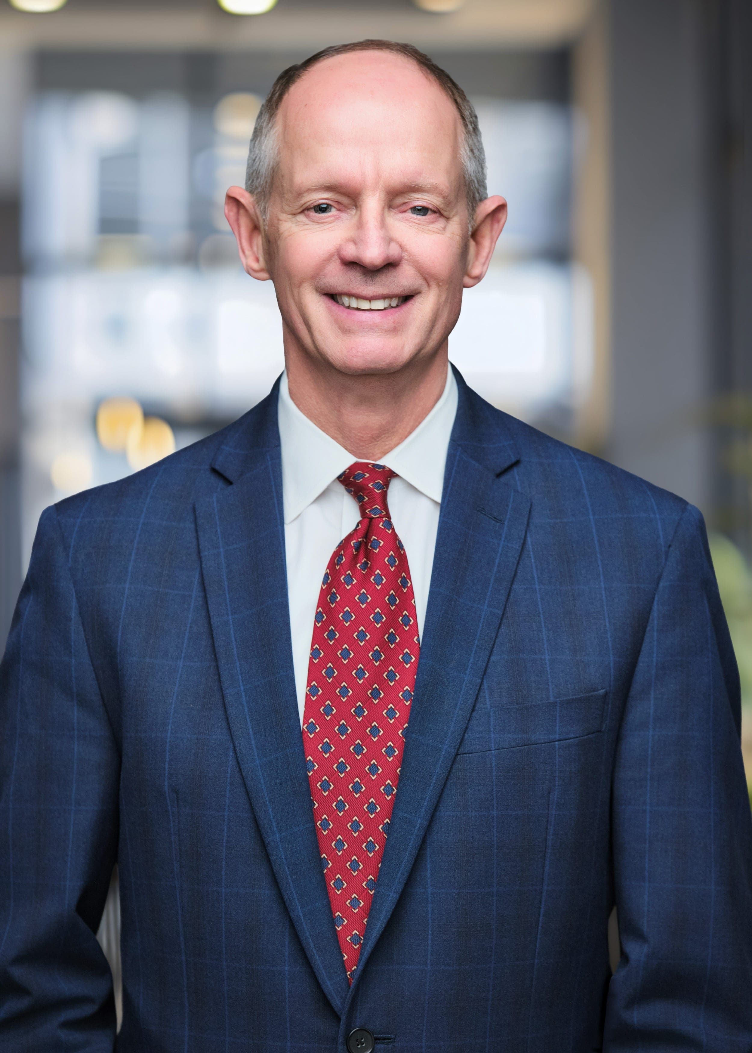 Tim Van Rhein of the Taxman & Landy Team at Merrill Lynch in Clayton. Professional headshot by Henry David Photography