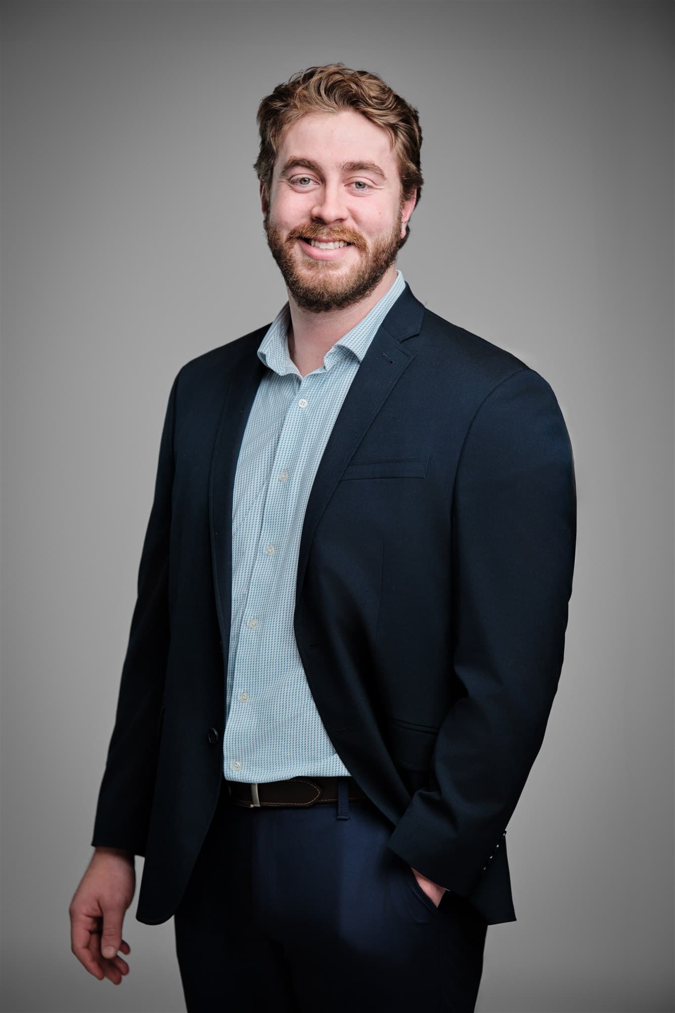MHS corporate headshot of Niko Hea with brand-consistent studio lighting by Henry David Photography