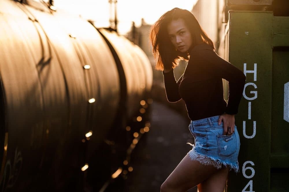 Urban trainyard senior portrait by Henry David Photography