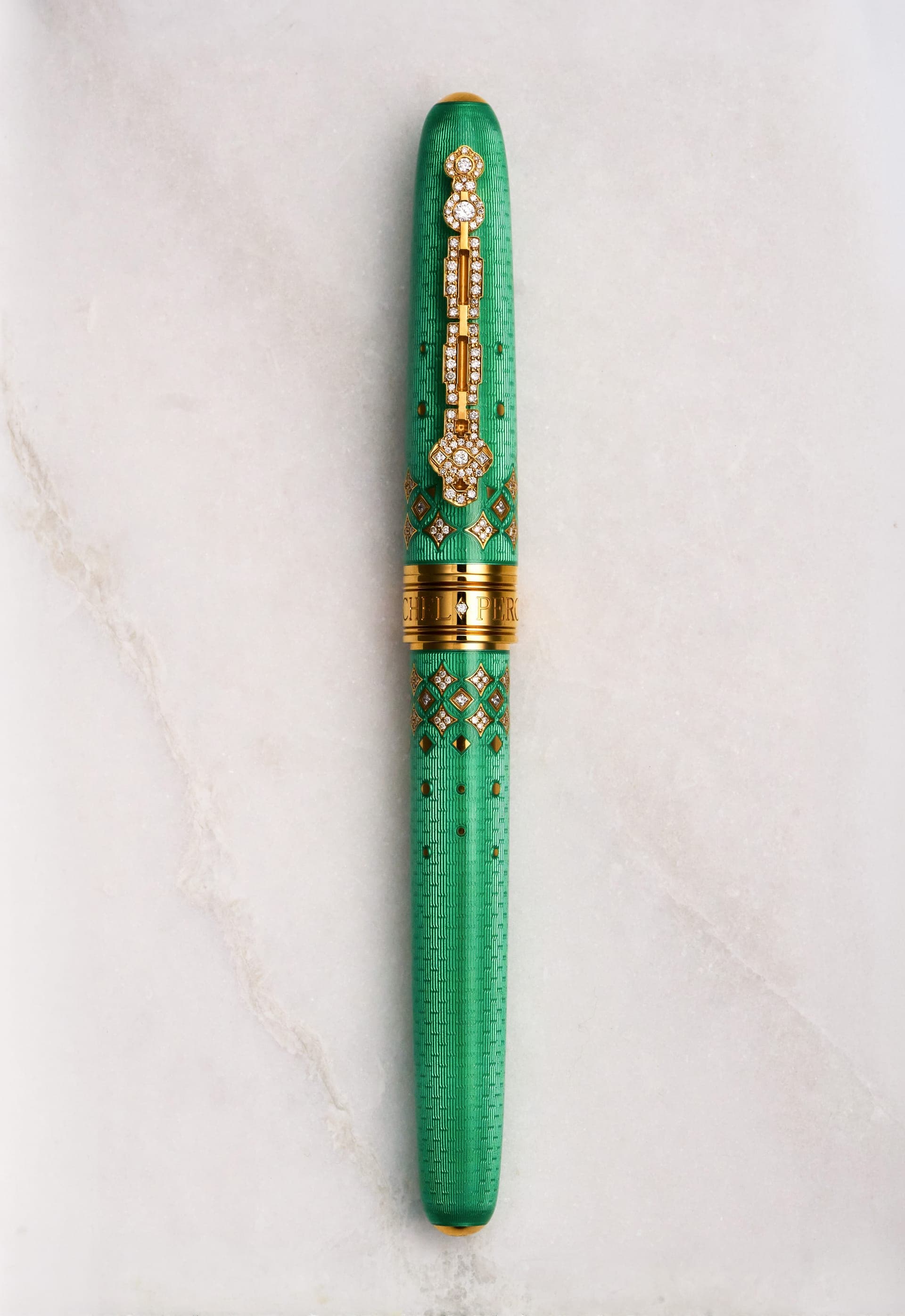 Michel Perchin Majesty green fired-enamel fountain pen with gold guilloche, luxury product photography by Henry David Photography in St. Louis