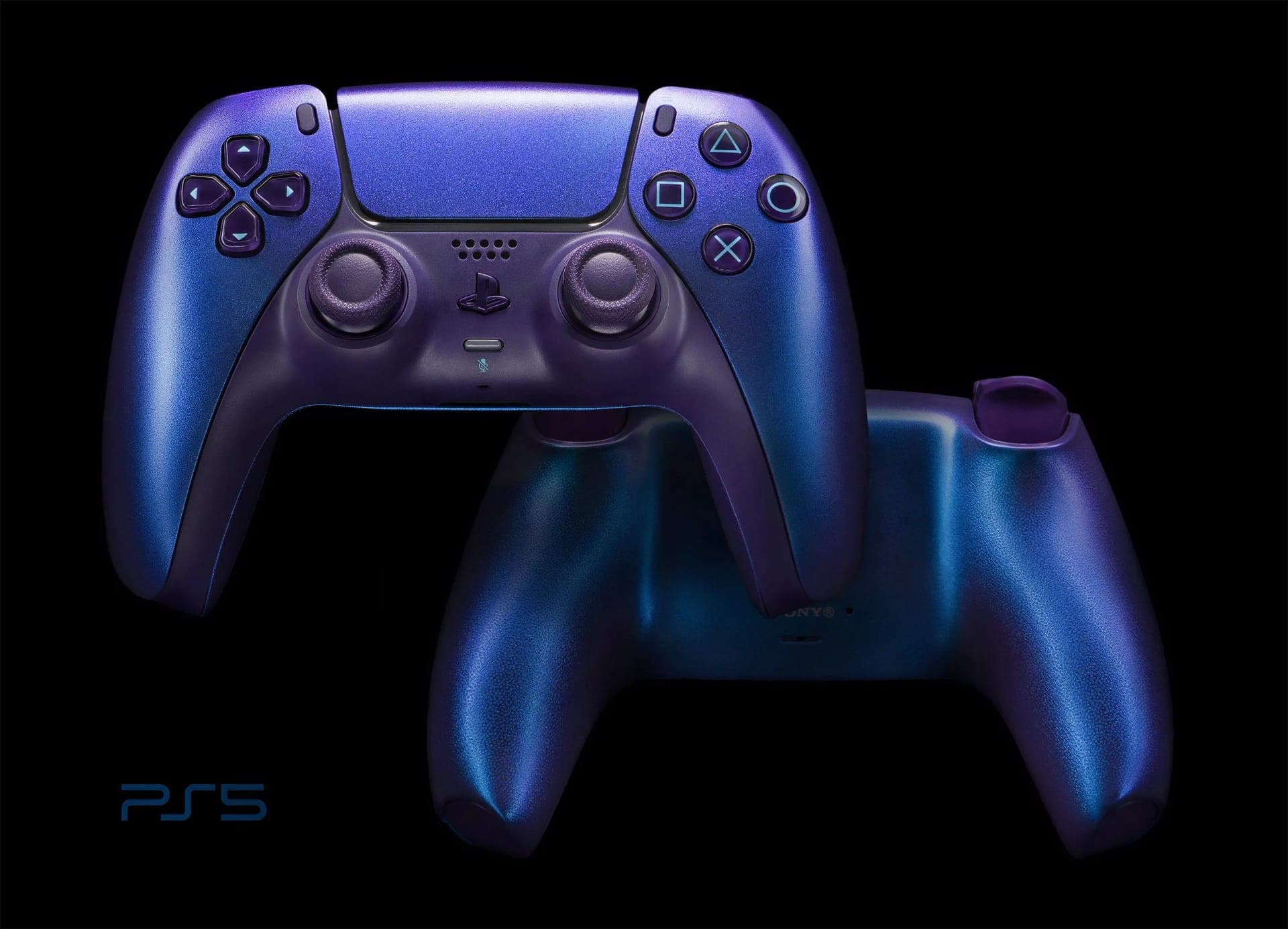 Purple and blue PlayStation 5 DualSense controller lit against a pure black background with controlled highlights, product photography by Henry David Photography in St. Louis