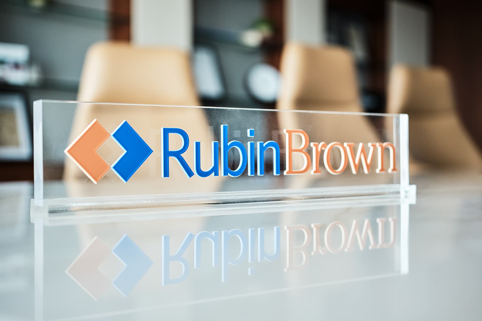 RubinBrown acrylic desk sign branding detail by Henry David Photography
