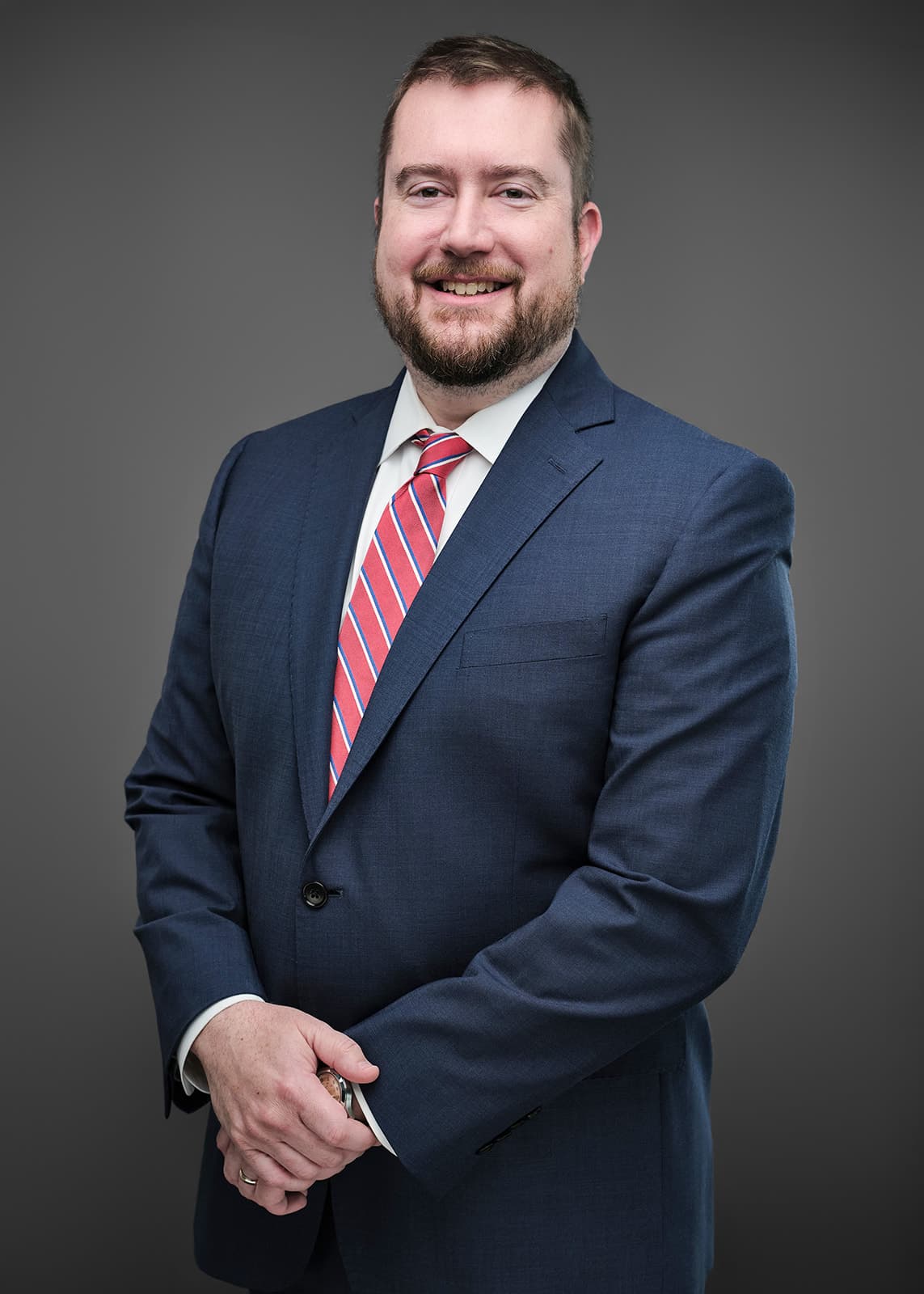 Professional corporate headshot of a RubinBrown team member, photographed on a consistent studio setup by Henry David Photography in St. Louis