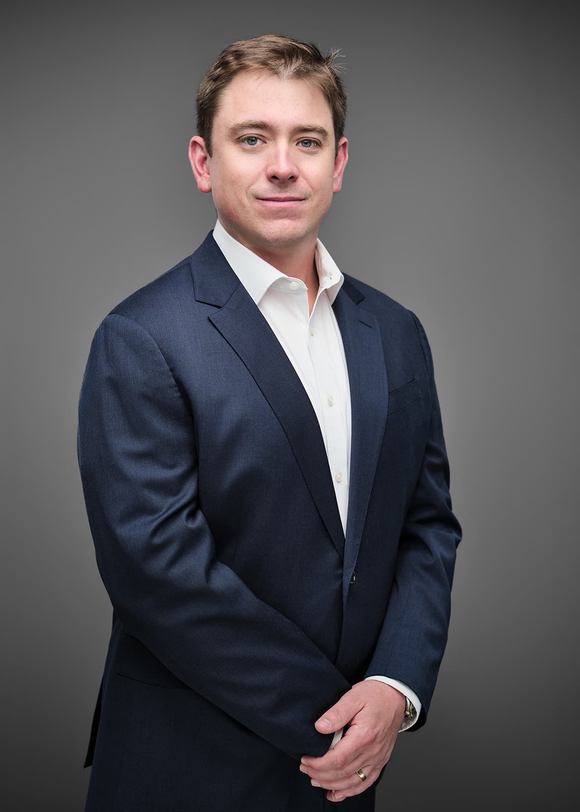 Professional corporate headshot of a RubinBrown team member, photographed on a consistent studio setup by Henry David Photography in St. Louis