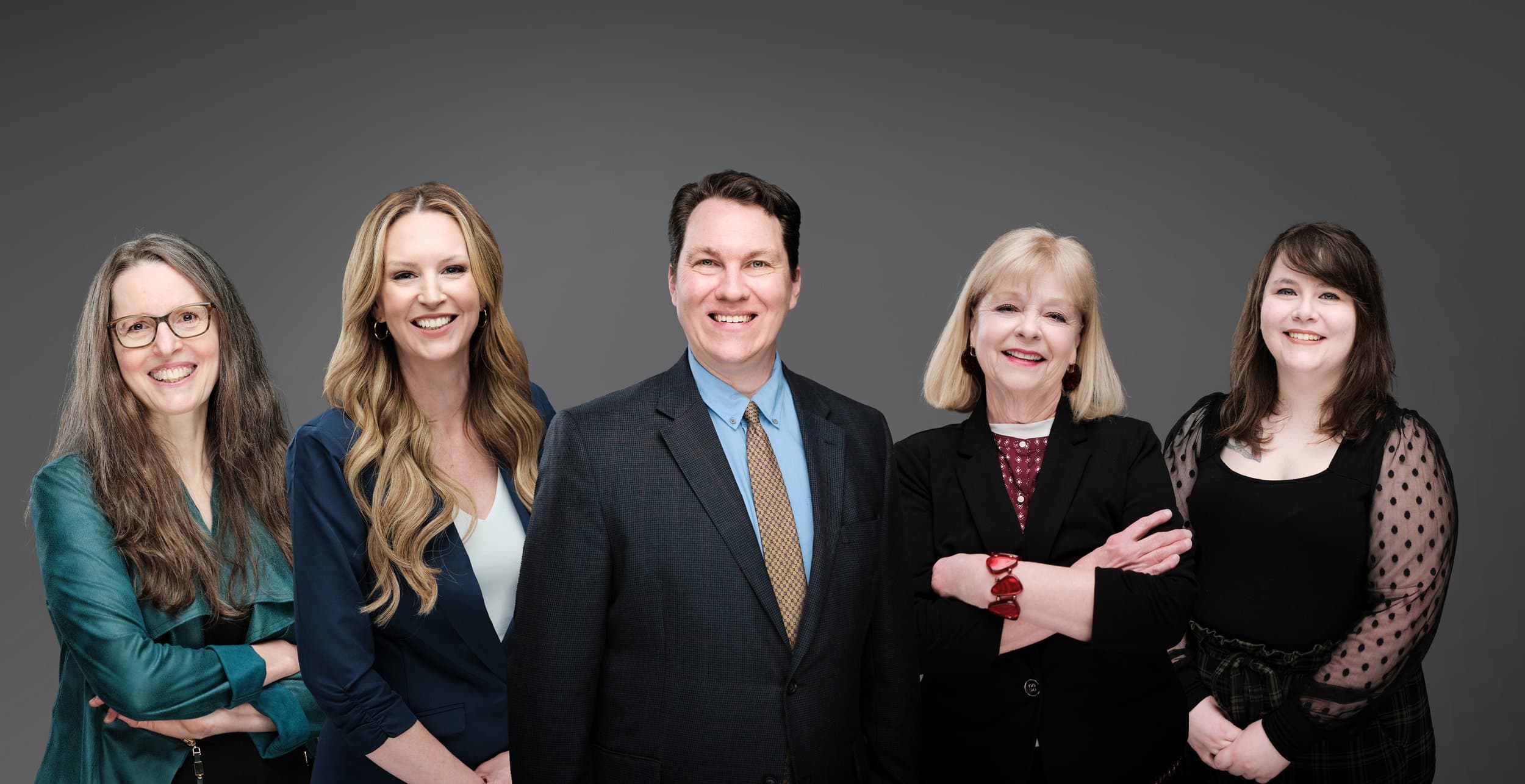 Team headshot composite demonstrating how individual portraits are assembled into a cohesive group portrait by Henry David Photography