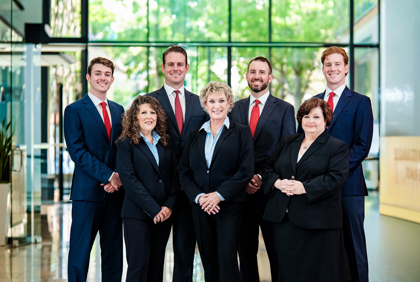Merrill Lynch Kansas City team group portrait in business attire, the kind of cohesive team image that anchors employer-brand recruiting campaigns
